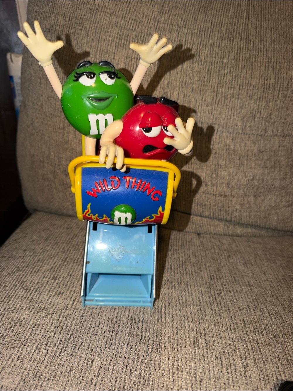 Vintage M&M'S Wild Thing Coaster candy dispenser with Red & Green Characters